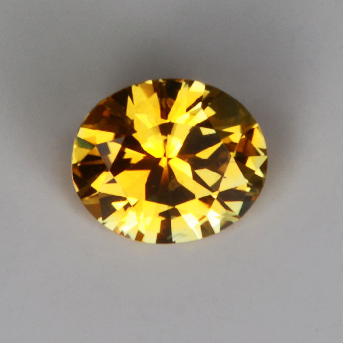 yellow color oval cut gemstone