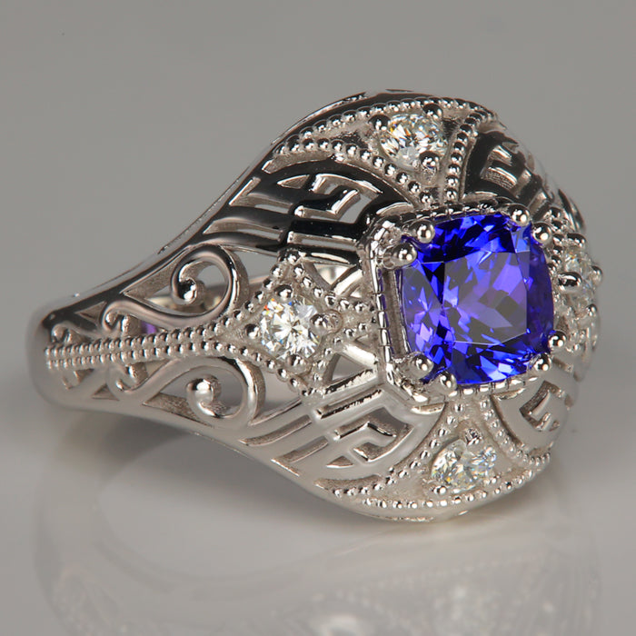 white gold tanzanite gem ring with diamond accents