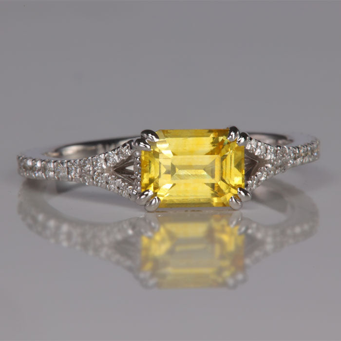emerald cut yellow sapphire ring with diamonds in white gold