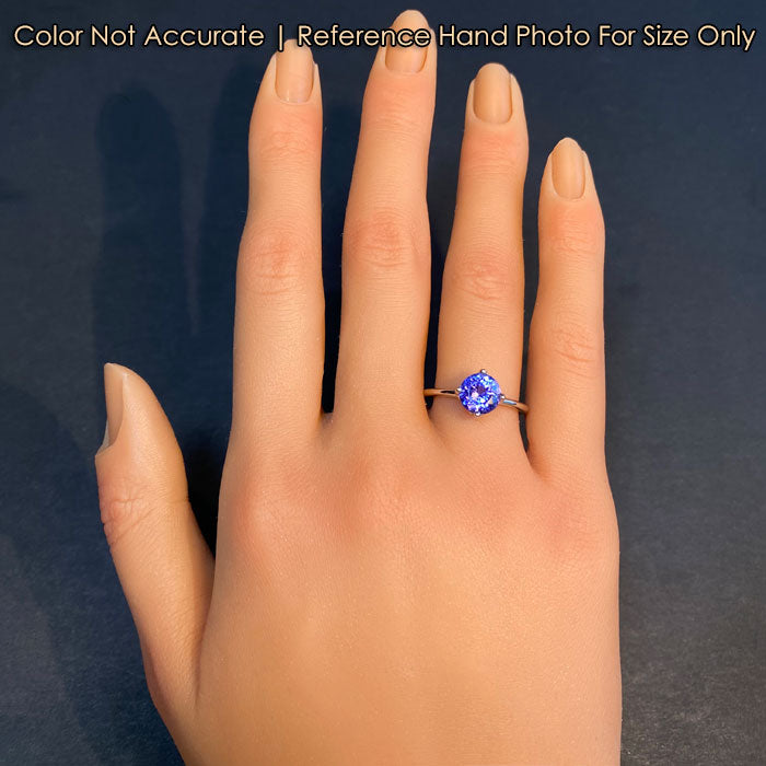 ring on hand tanzanite gemstone platinum and diamond accents