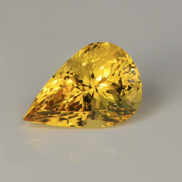 golden yellow beryl gemstone pear shape brilliant