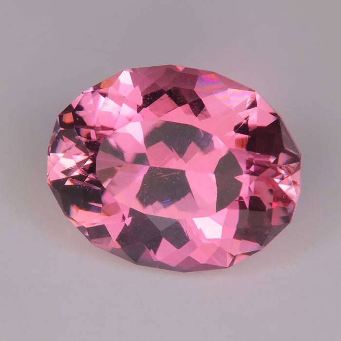 pink color oval cut tourmaline gemstone