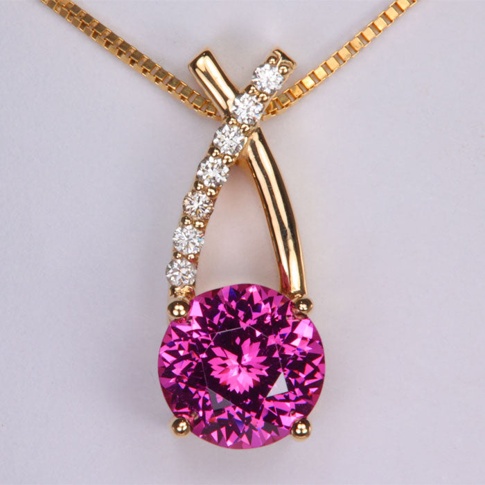 pink mahenge malaia garnet pendant in yellow gold with diamonds 