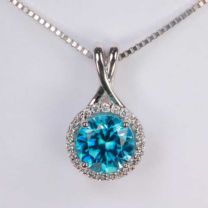 blue zircon gemstone in white gold with diamond halo