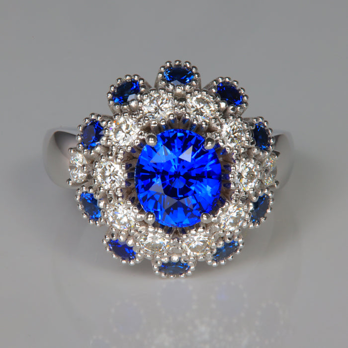 oval cut sapphire and diamond ring with sapphire accents in white gold