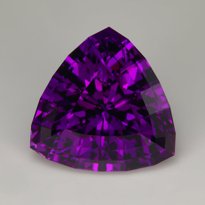 purple amethyst gemstone from brazil trilliant cut 