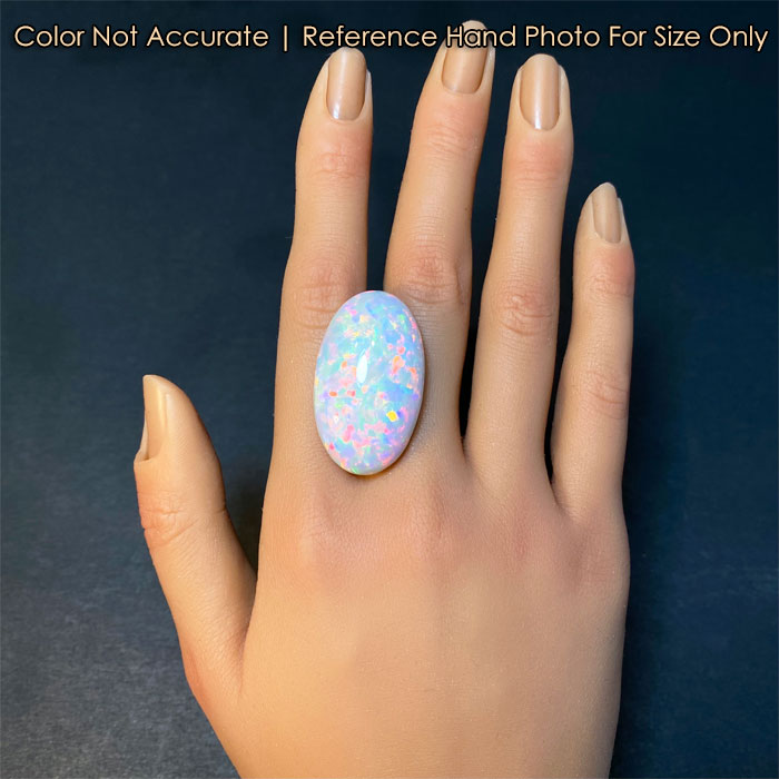 opal gem oval cut on hand