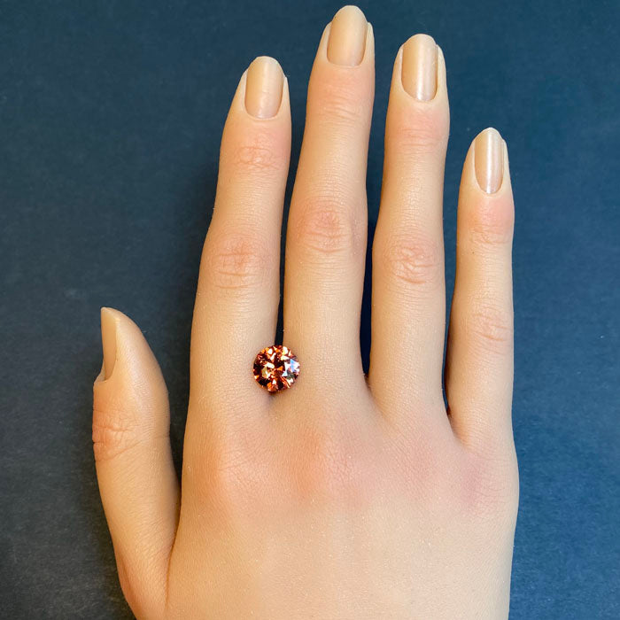 pinkish orange malaia garnet round cut