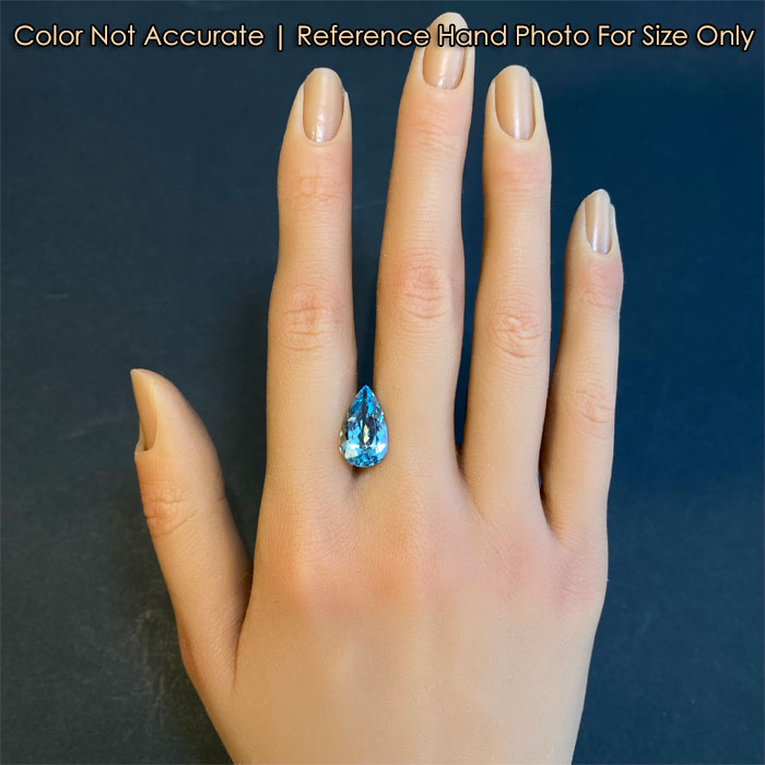 pear shape blue aquamarine on hand 