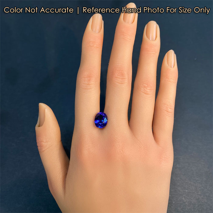 tanzanite gemstone violet blue on hand 