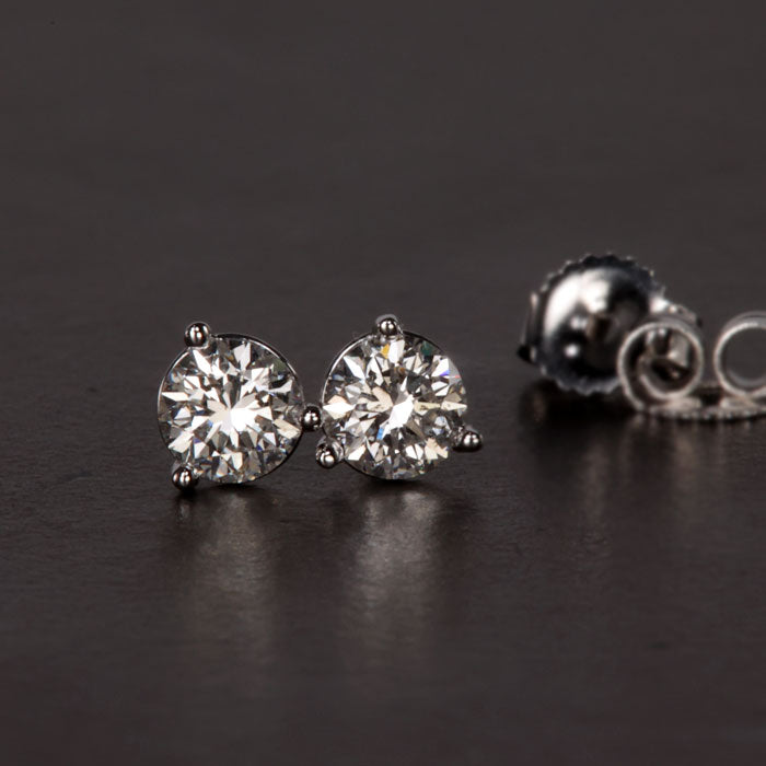 round brilliant diamond stud earrings in white gold