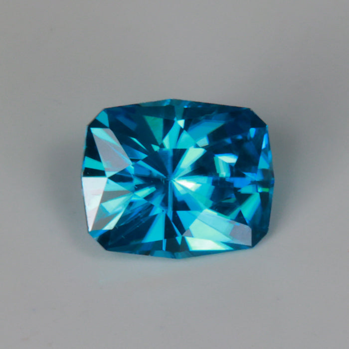 greenish blue brilliant blue zircon gemstone