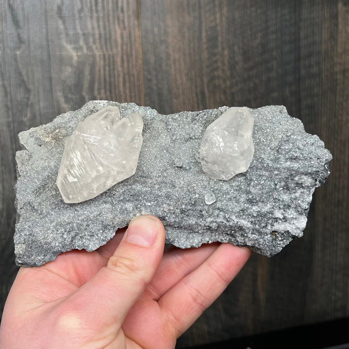 two calcite crystal mineral specimens