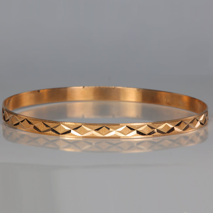 yellow gold diamond cut bracelet x design