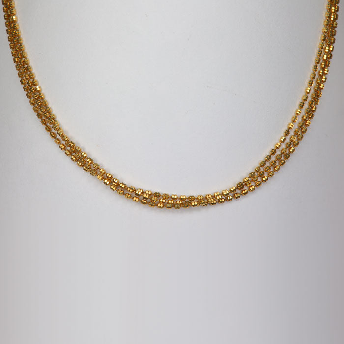 yellow gold chain with diamond cut beads