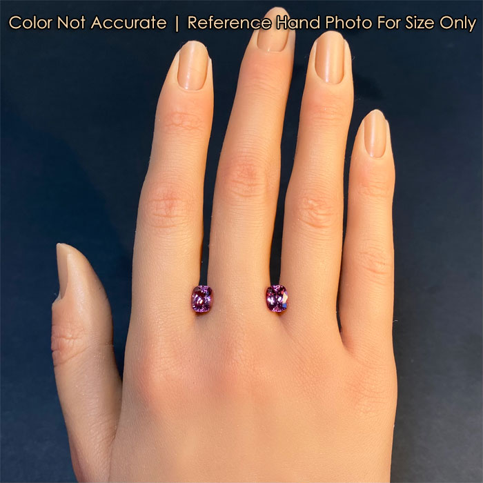 pair of pink garnets on hand