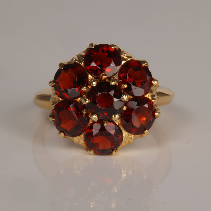 garnet gemstone cocktail ring yellow gold