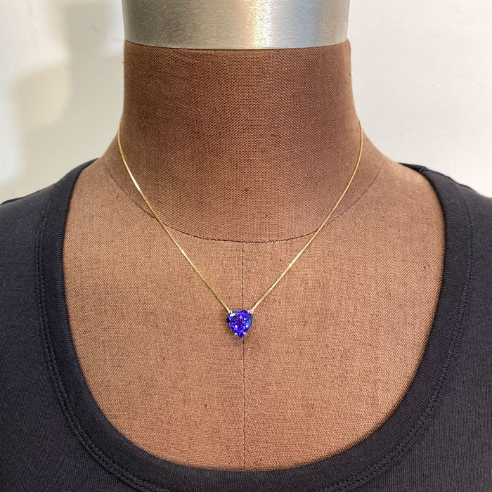 heart tanzanite necklace on bust in yellow gold