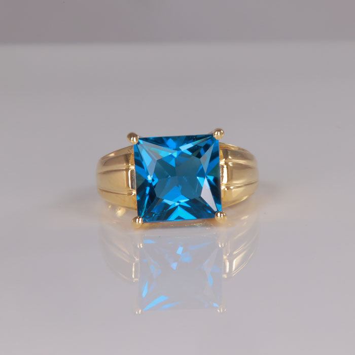 london blue topaz ring in yellow gold