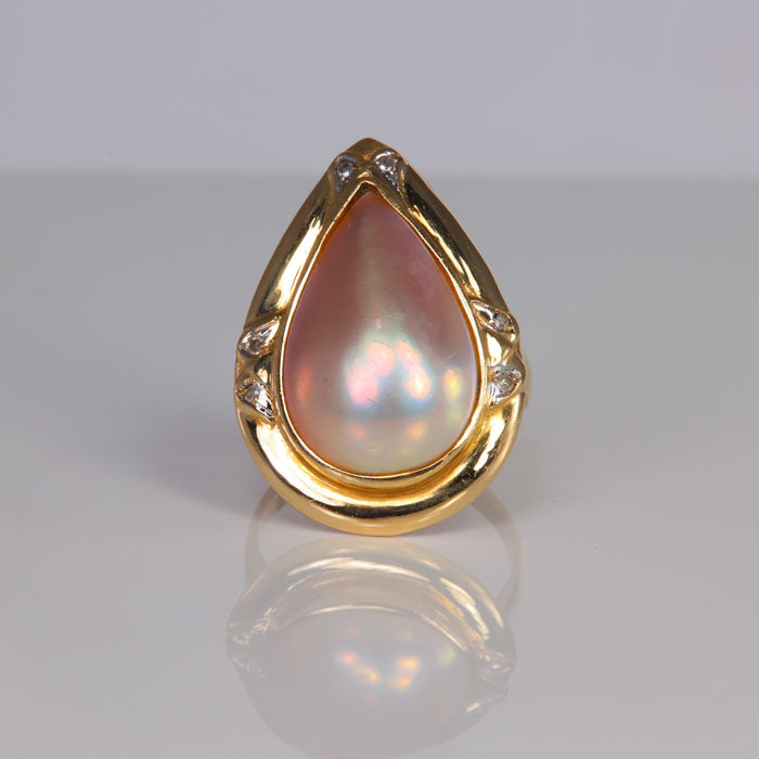 champagne pink mabe pearl and diamond accent ring in yellow gold