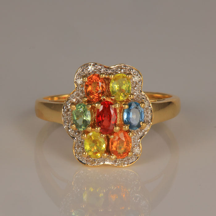 sapphire and ruby ring in yellow gold with diamond accents