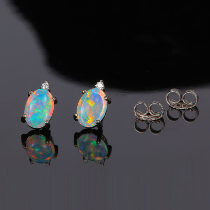 opal and diamond stud earrings white gold