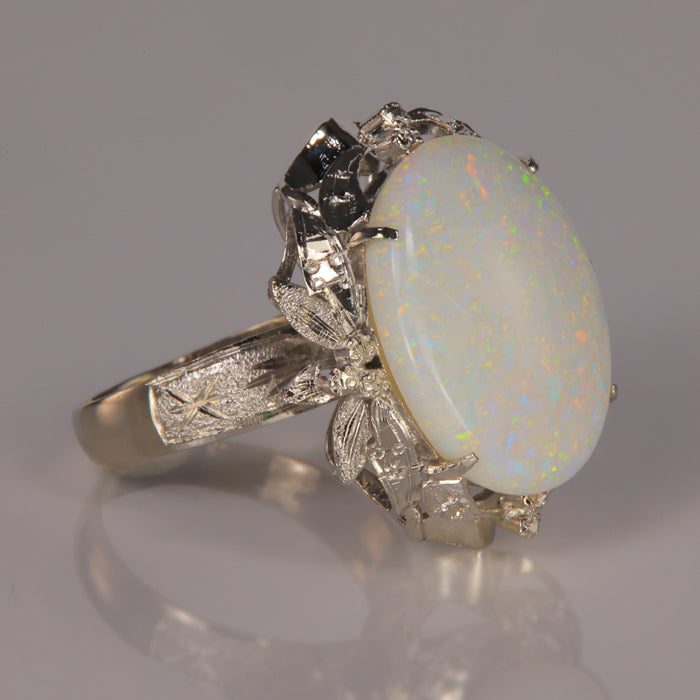 estate ring with opal in white gold