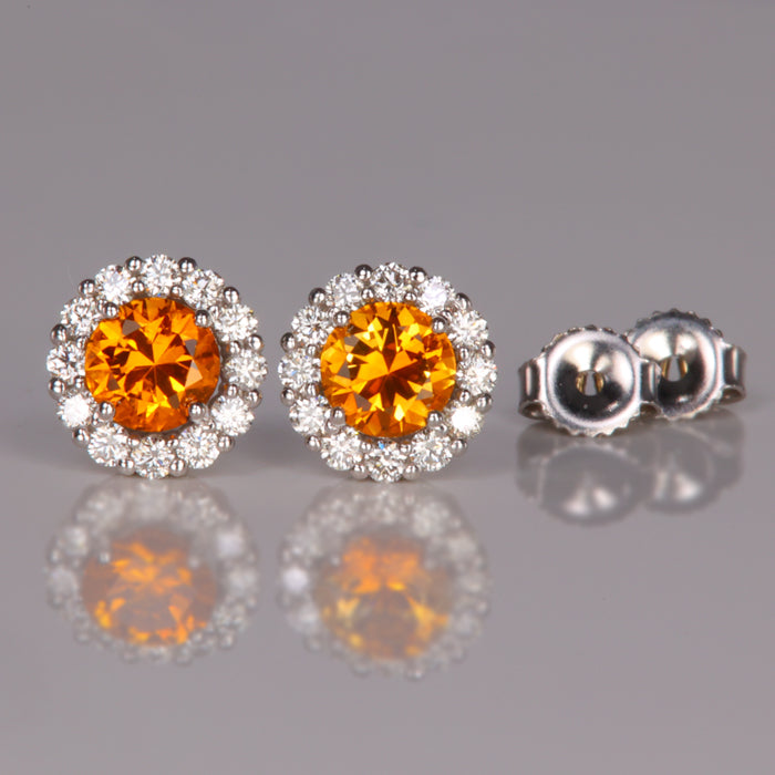 orange sapphire and diamond studs in white gold