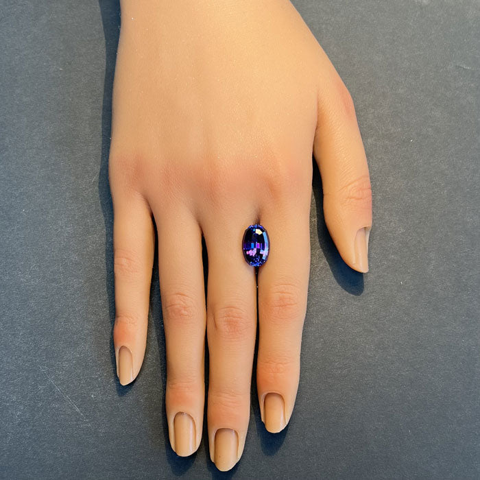 Oval Tanzanite Gemstone on Hand