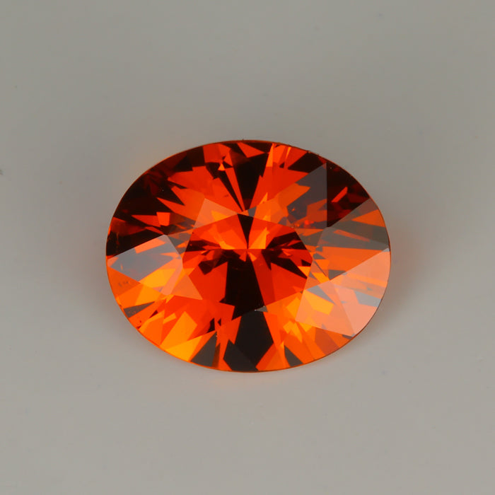 garnet gemstone oval cut orange color 