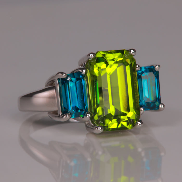 peridot blue zircon ring in white gold