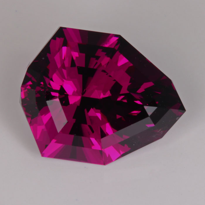 Shield Cut Purple Garnet 25.37 Carats Moriartys Gem Art