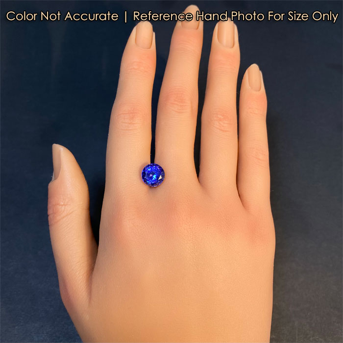 tanzanite gem violet blue on hand