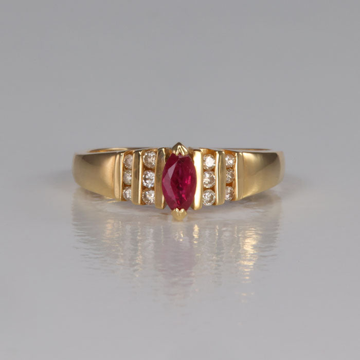 marquise ruby and round diamond ring inyellow gold estate piece
