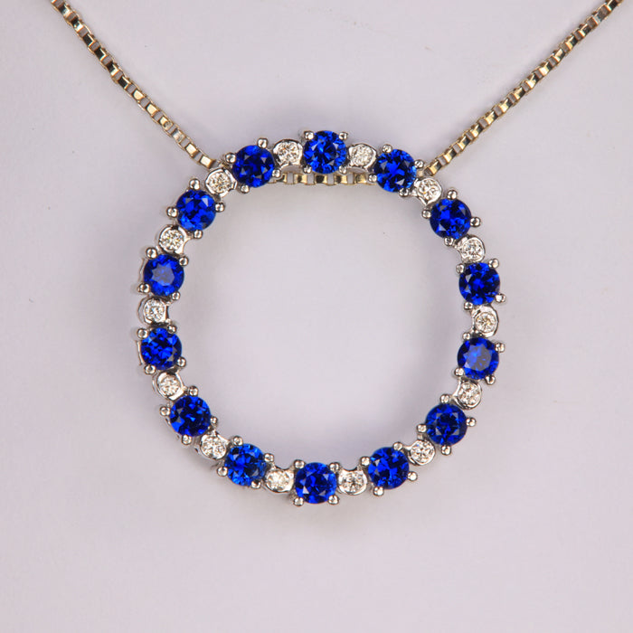 fine blue sapphire and diamond pendant set in white gold 