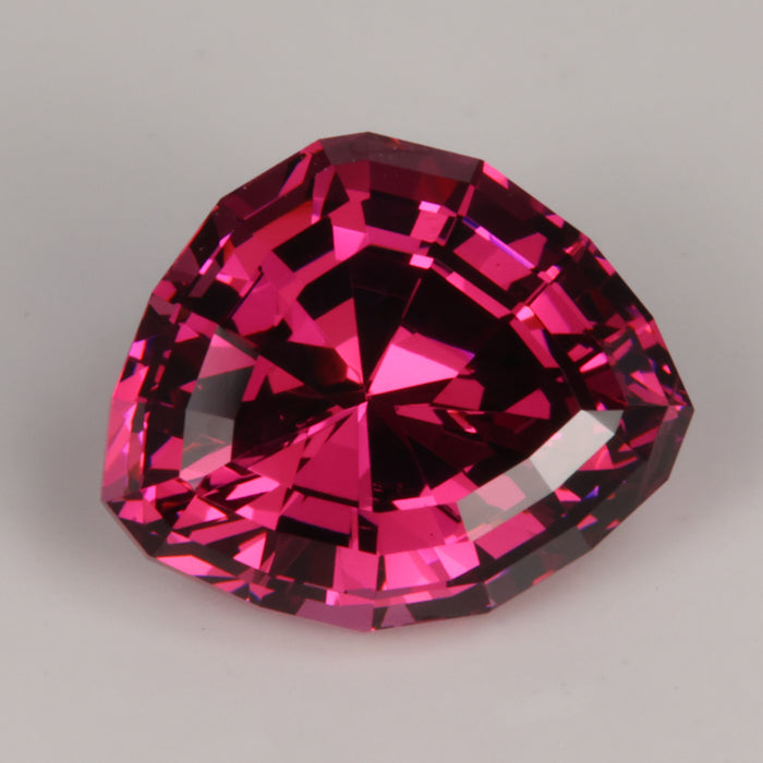 violet red umbalite garnet gemstone stepped shield cut