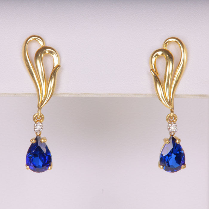 synthetic sapphire and diamond in yellow gold earrings