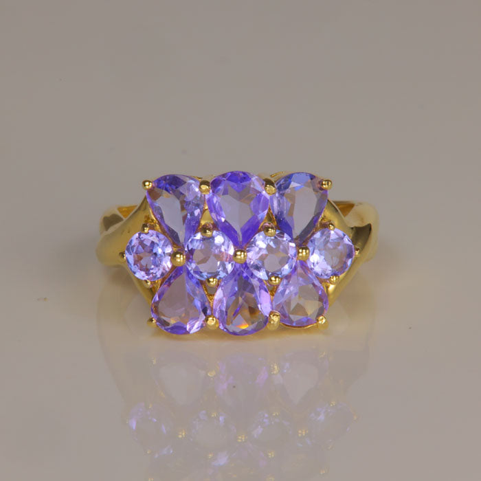 light violet tanzanite ring in yellow gold