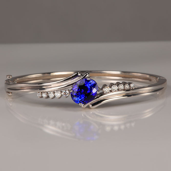 white gold tanzanite gemstone and natural diamond bangle bracelet