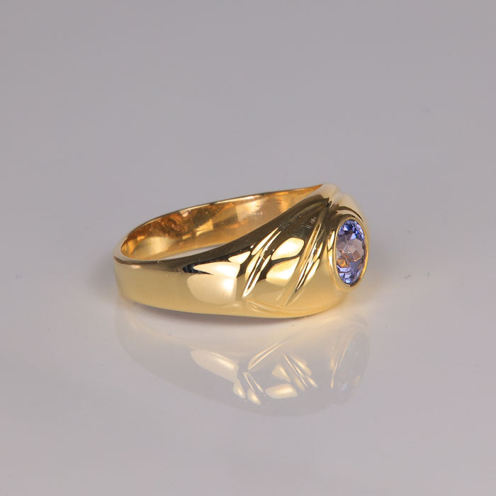 yellow gold and tanzanite ring