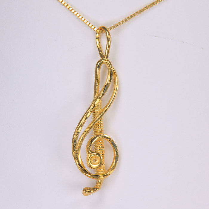 yellow gold pendant treble clef musical note design