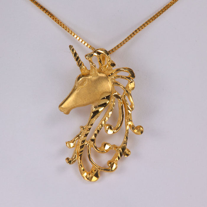 yellow gold estate piece unicorn pendant