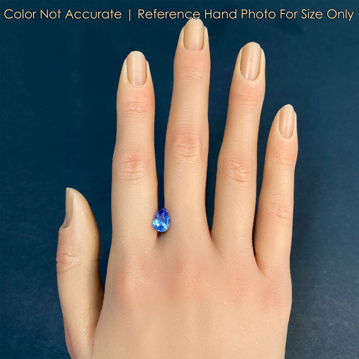 pear shape brilliant sapphire on hand 