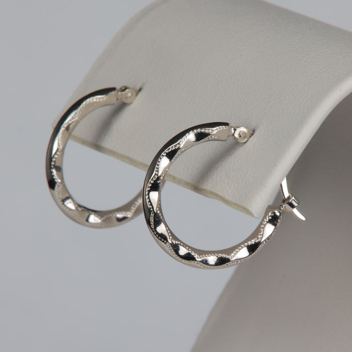 estate hoop earrings in white gold with textured details