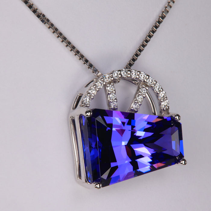 brilliant tanzanite gemstone and diamond pendant in white gold