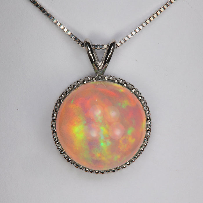 white gold round opal pendant 