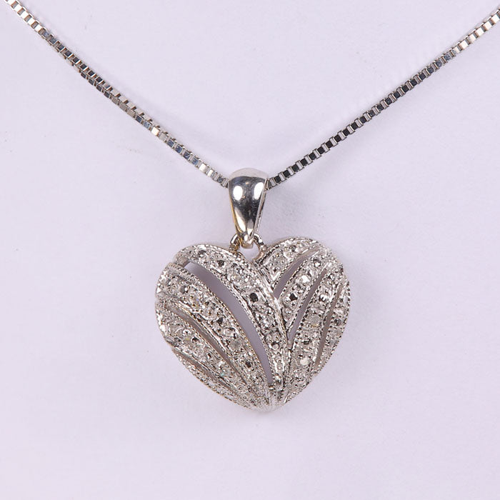 heart pendant in white gold with diamonds