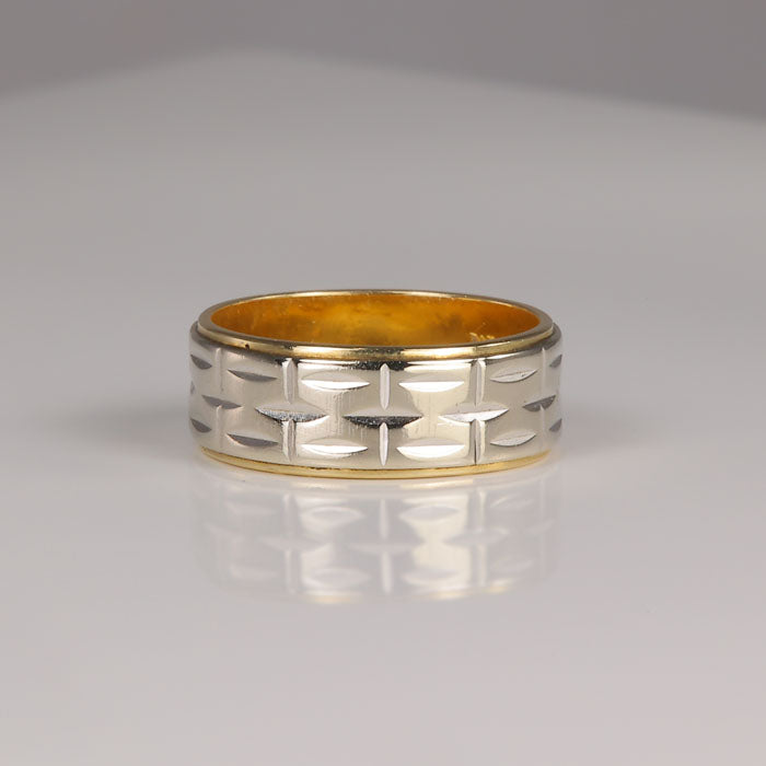 band with engraving in white and yellow gold