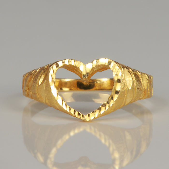 estate ring with heart shape diamond cut detail
