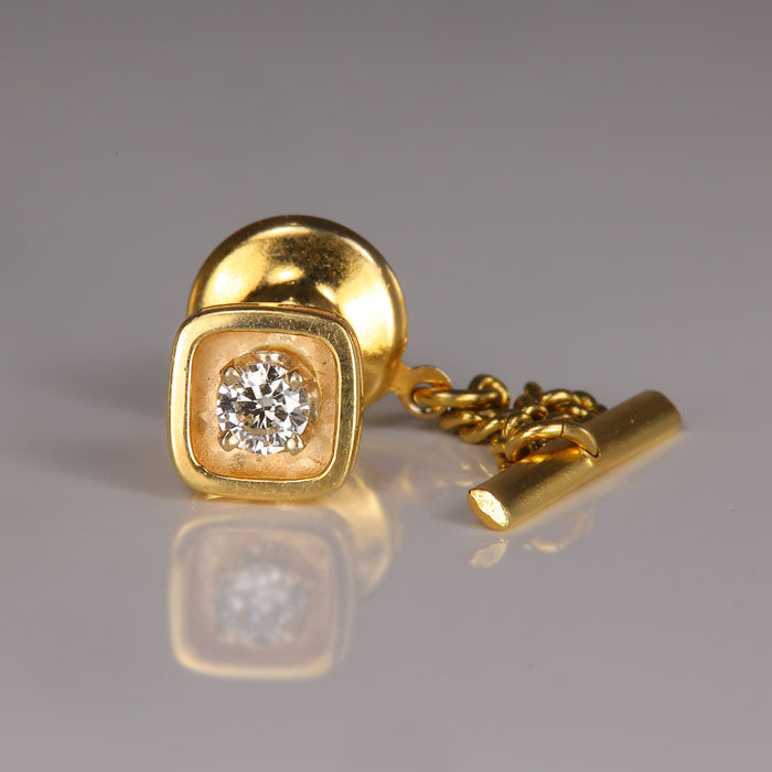 tie tack with diamond accent in yellow gold